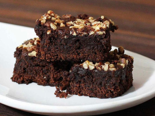 Protein Caramel fudge Brownies topped with Candied spiced pecans